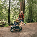 switch & jog stroller in the woods